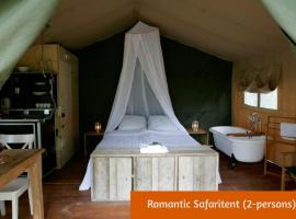 Safaritents & Glamping by Outdoors، كوخ في هولتين