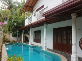 Mango Tree House, hotell sihtkohas Beruwala