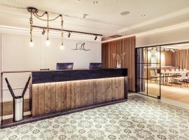 Hafenhotel zu Putbus, хотел в Путбус