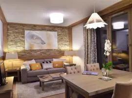 Appartement Raffiné aux Pieds des Pistes avec Parking et Accès Fitness - FR-1-562-52