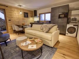 Superbe appartement dans luxueux chalet Mt Charvin, chalé alpino em Crest-Voland