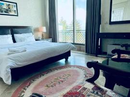 White House Cottages – hotel w mieście Murree