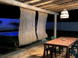 Las Casitas de la Barrosa con jardín y piscina, hotel em Chiclana de la Frontera