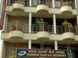 Sharada KK Residency, alojamiento con onsen en Mysore