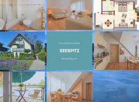Ferienwohnung Seespitz，阿默湖畔黑爾興的海濱度假屋