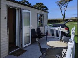 Older Style Caravan Pebble Bank T10, campsite in Wyke Regis