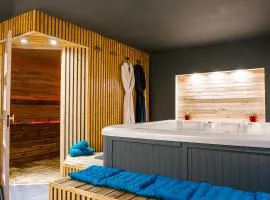 L'alcôve du 510 - Spa - chambre romantique - sauna - salle de jeux
