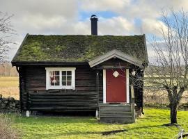 Backgårdens Timmerstuga, cabaña o casa de campo en Falkoping