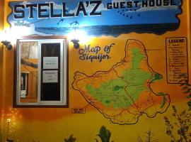 Stella'z guesthouse, rum i privatbostad i Siquijor