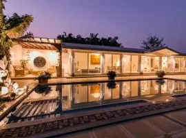 StayVista's Le Sutra Great Escapes - 5BR - Geometrica - Artistic Rooms, Mountain View, Pool, and Gazebo Retreat