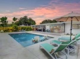 The Pink Flamingo Mid Century Heated Pool Paradise