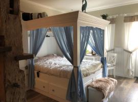 BnB onder de Blauwe Hemel, מקום אירוח B&B בVlijmen