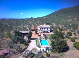 Huerta Carrión, Finca en El Pedroso, casa de temporada em El Pedroso