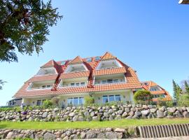 hafennahe Ferienwohnung mit Balkon und Meerblick - Hafenhäuser Breege FeWo 11，位于布雷格的酒店