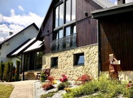 Stodoła Simonka na punkcie widokowym, hotel a Zawoja