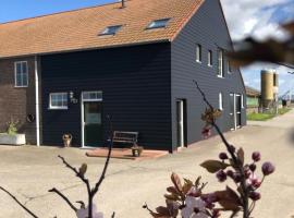 Appartement De Graanzolder aan Zeeuwse kust, hôtel 5 étoiles à Hoofdplaat