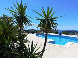 Saha tourist accommodation among olive trees and sea view, hotel in Sperlonga