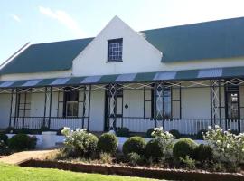 Vredelus Farm Stay, hotel en De Rust