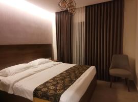 Dara apartment hotel, hotel u gradu 'Umm Uthainah'