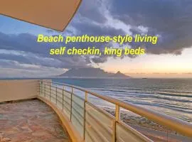 Beach penthouse-style living,self checkin,king beds