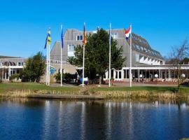 ZEEDUIN, met ZONNIG TERRAS - volledige KEUKEN- Resort Amelander Kaap, Incl verwarmd Hotel-ZWEMBAD nabij Dorp, Duinen en Strand, wellness hotel v destinaci Hollum