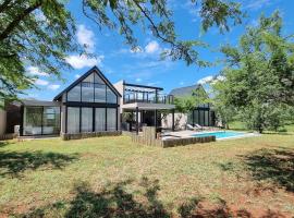 Lindi Lodge, Mjejane Game Reserve, hytte i Hectorspruit