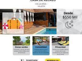 Hermosa casa de campo con piscina y zonas de juego, casa rural en Villeta