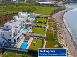 BLUE CORAL BEACH VILLAS three exclusive villas - Poseidon - Nautilus - Oceanos - and - Baby Coral bungalow, hotel en Bahía de Coral