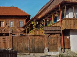 Székelyföld ,Siklódi Kő Vendégház, Tornácosház, hotel v destinaci Bartoştana