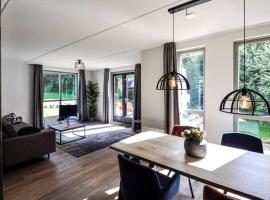Tof wellness huis, alles nieuw, gelegen bij meer., holiday home in Ewijk