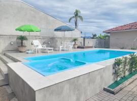 Casa Aconchego - piscina com hidromassagem, hytte i Guaratuba