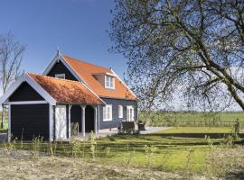 Rustic Holiday Home In Wissenkerke With Garden, cottage in Wissenkerke