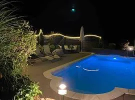 Appartement mit Alpensicht, beheiztem Pool, Garten