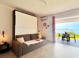 Le Sea-Breeze - Beau studio piscine VUE LAGON โรงแรมในมาริโก