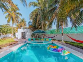 Casa Amaite Oasis privado con Alberca en Progreso, hotel económico en Progreso