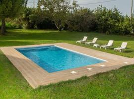 Casa Rural en Rupià con piscina, casa rural en Rupià