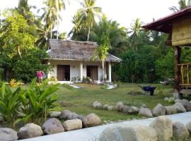 Happy Coconut Camiguin โรงแรมในมัมบาเฮา