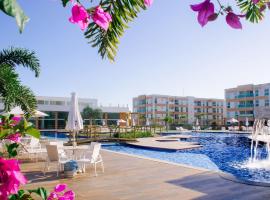 Flat em Porto de Galinhas - Muro Alto Clube, παραθεριστική κατοικία στο Πόρτο ντε Γκαλίνας