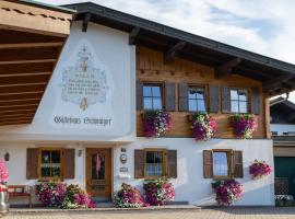 Gästehaus Schwaiger - Wiesenweg, kotimajoitus kohteessa Kössen