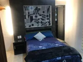 Habitación Irving confortable con baño privado