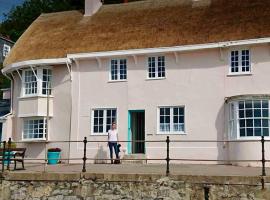 Benwick Cottage - Beachfront Thatched Cottage set on the marine parade with absolutely spectacular Sea views! Sleeps 4, holiday home in Lyme Regis