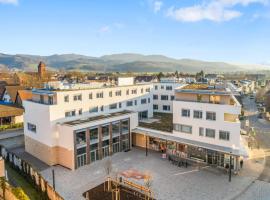 Empire Living: Denzlingen Marktplatz, Ferienwohnung in Denzlingen