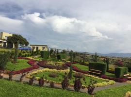 Casas La Colina, Ferienunterkunft in Curití