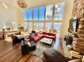 Modern 6 bedroom retreat, stunning lake views, close to village!