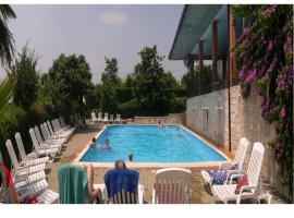 Residence Miralago Rooms & Apartments, hotel romântico em Manerba del Garda