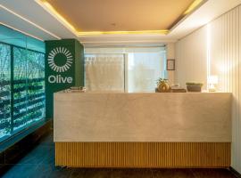 Olive MG Road Dunsvirk Inn - by Embassy Group, hotel en MG Road, Bangalore