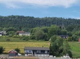 Strandhytte ved fjorden, kotedžas Moldėje