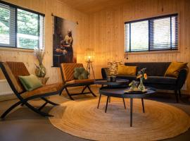 Vakantiehuisje Jipué met sauna en bubbelbad., holiday rental in Bruchterveld