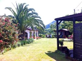 Villa La Finca - Casa y Jardín, aluguel de temporada em Onón