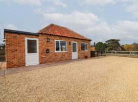 The Old Stables, hotel with parking in Oasby